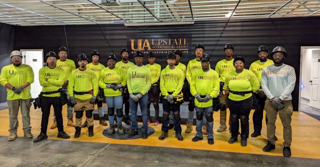 Group of construction workers in bright shirts