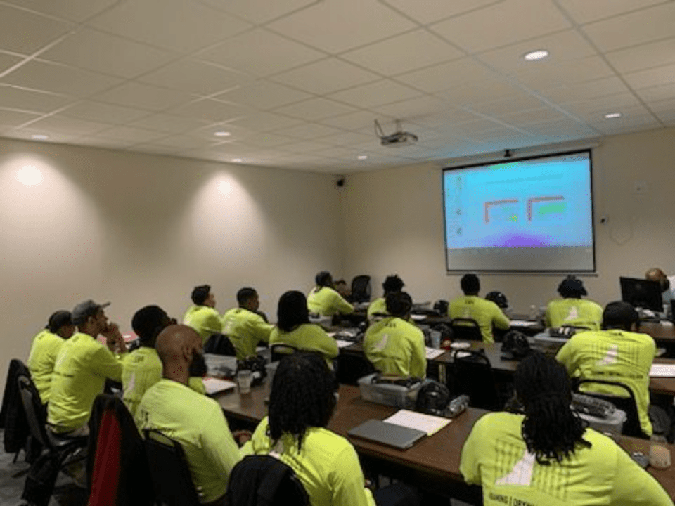 Group learning in bright shirts
