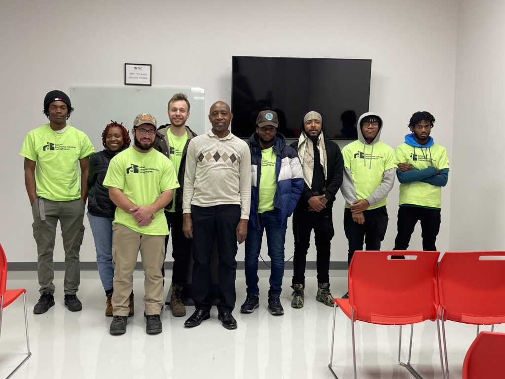 Group of people standing indoors