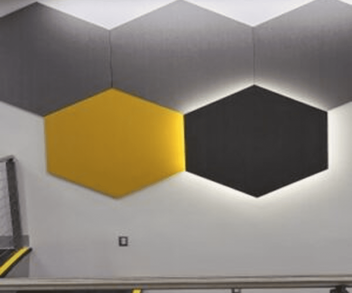Hexagonal wall panels in yellow and gray