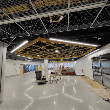 Construction site with workers and tools