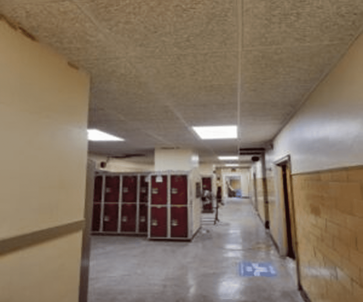 Interior hallway featuring red lockers