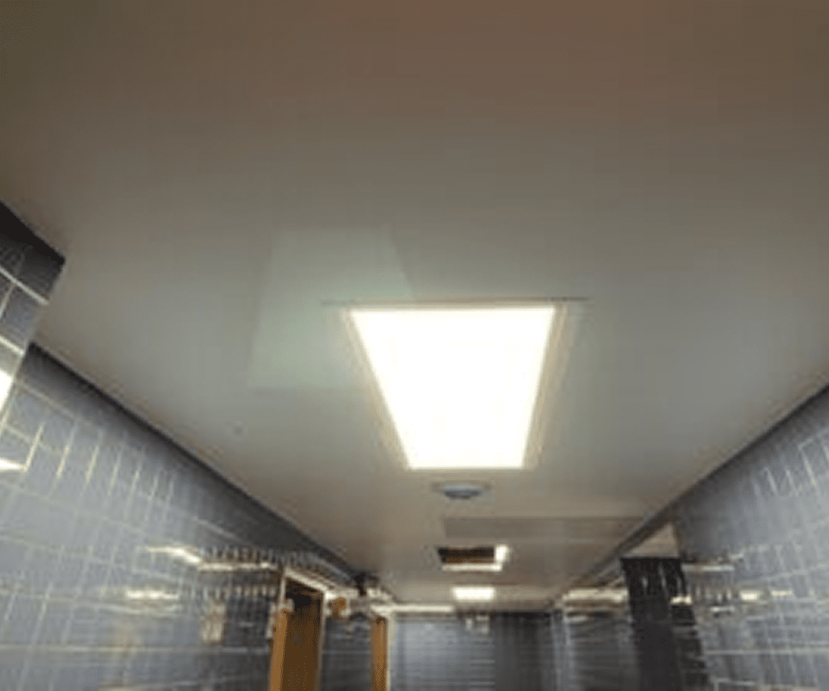 Ceiling light in tiled hallway