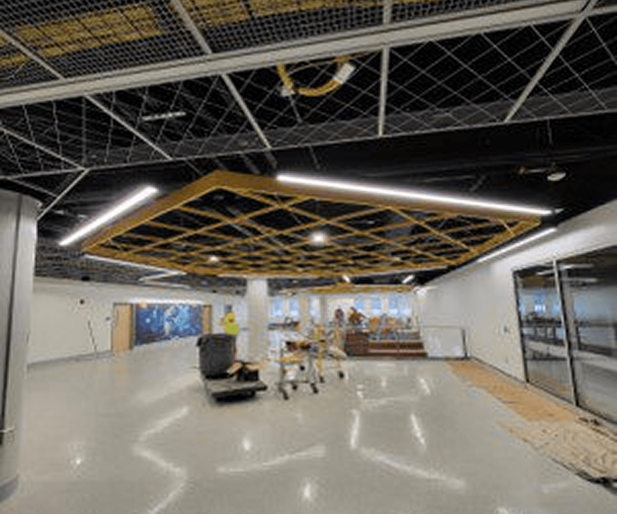 Unfinished interior with grid ceiling