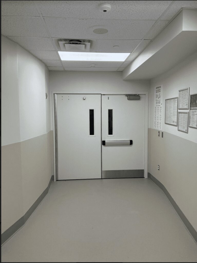 Hospital corridor with double doors